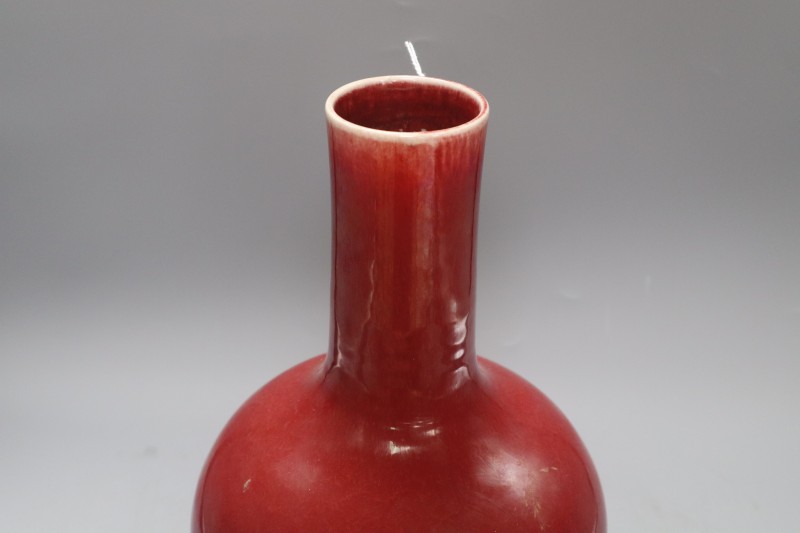 A Chinese sang de boeuf bottle vase, height 34cm